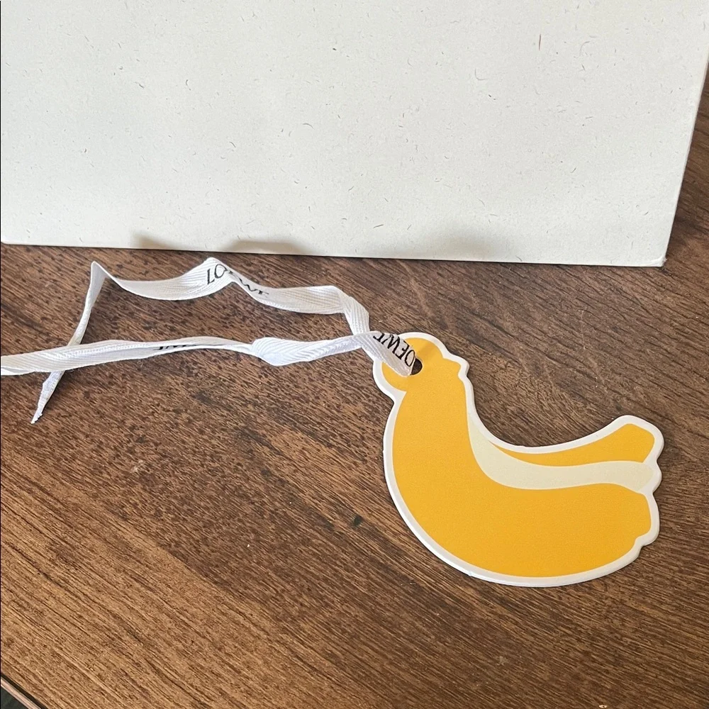Loewe Cream Paper Gift Bag with Black Logo and Yellow Tag